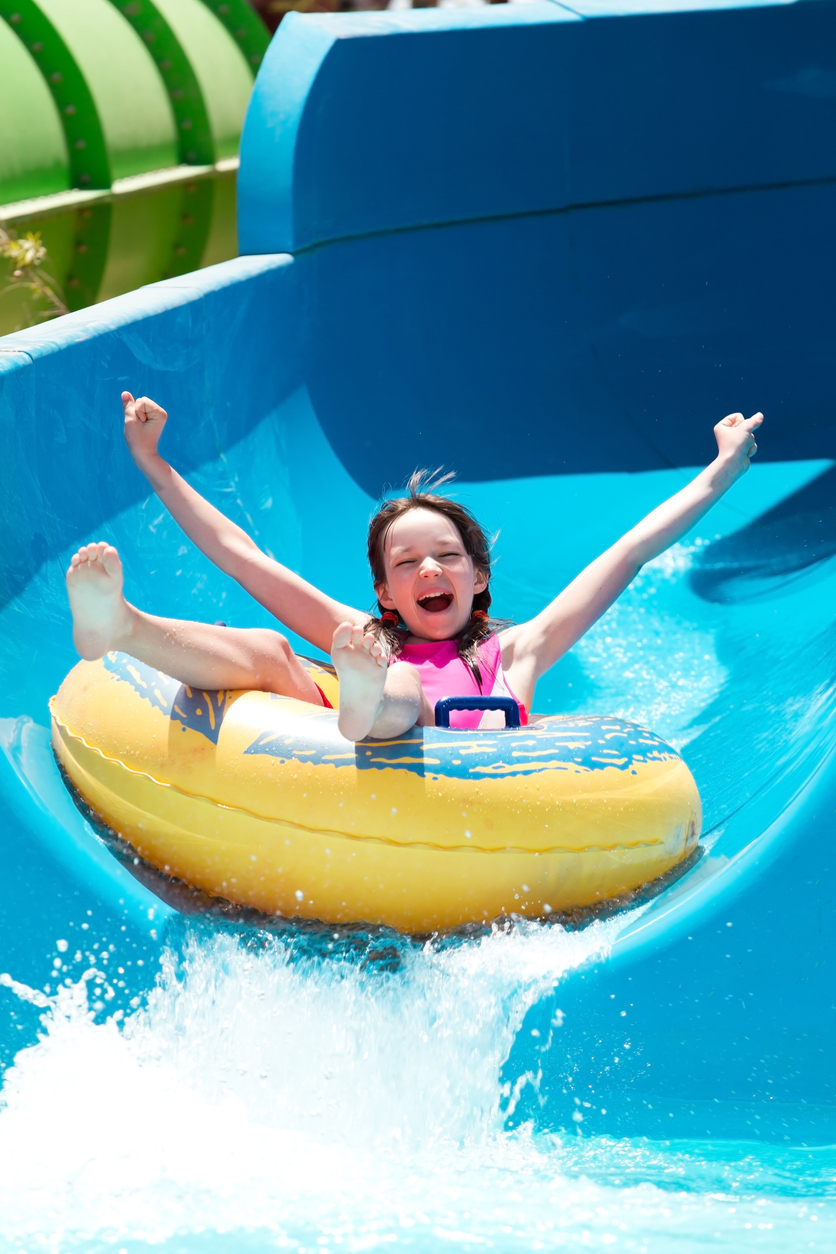 Girl on water slide